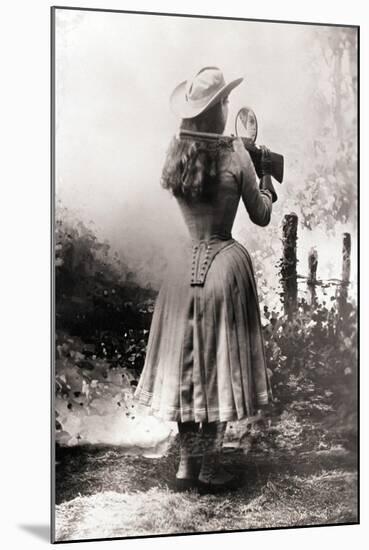 Annie Oakley Shooting over Shoulder-null-Mounted Premium Photographic Print