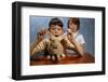 Annoying Brother Playing with His Sister's Pet Rabbit-William P. Gottlieb-Framed Photographic Print