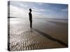 Another Place Sculpture by Antony Gormley on the Beach at Crosby, Liverpool, England, UK-Martin Child-Stretched Canvas