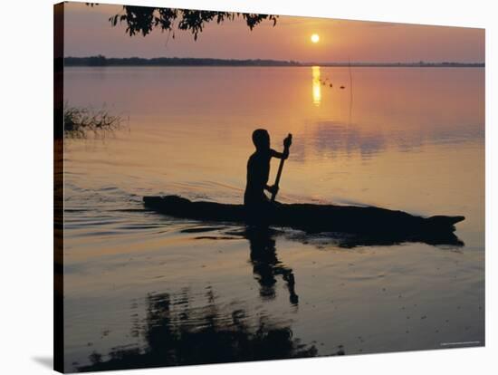 Anouak Man in Canoe, Lake Tata, Ethiopia, Africa-J P De Manne-Stretched Canvas