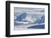 Antarctic Peninsula, Antarctica, Damoy Point. Gentoo penguin, mountain landscape.-Yuri Choufour-Framed Photographic Print