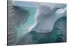 Antarctica. Argentine Islands. Unusually Shaped Iceberg-Inger Hogstrom-Stretched Canvas