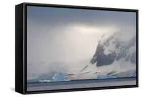 Antarctica. Bransfield Strait. Iceberg under Stormy Skies-Inger Hogstrom-Framed Stretched Canvas