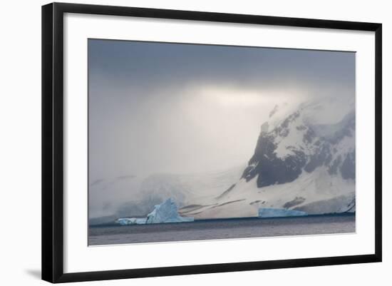 Antarctica. Bransfield Strait. Iceberg under Stormy Skies-Inger Hogstrom-Framed Photographic Print