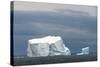 Antarctica. Bransfield Strait. Iceberg under Stormy Skies-Inger Hogstrom-Stretched Canvas