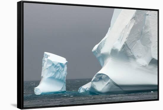 Antarctica. Bransfield Strait. Iceberg under Stormy Skies-Inger Hogstrom-Framed Stretched Canvas