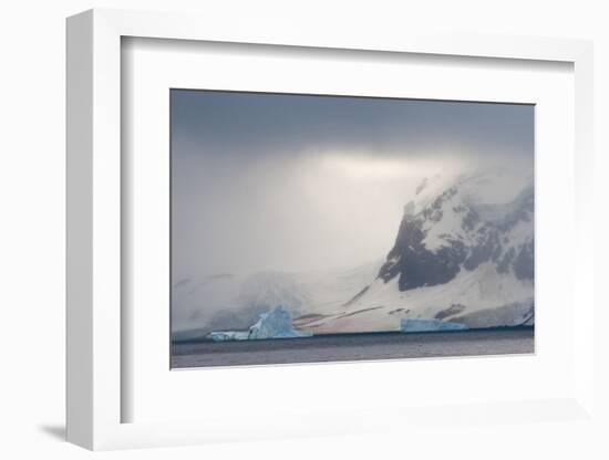 Antarctica. Bransfield Strait. Iceberg under Stormy Skies-Inger Hogstrom-Framed Photographic Print