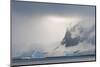 Antarctica. Bransfield Strait. Iceberg under Stormy Skies-Inger Hogstrom-Mounted Photographic Print