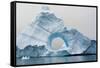 Antarctica. Charlotte Bay. Giant Iceberg with a Hole-Inger Hogstrom-Framed Stretched Canvas