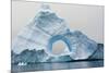 Antarctica. Charlotte Bay. Giant Iceberg with a Hole-Inger Hogstrom-Mounted Photographic Print