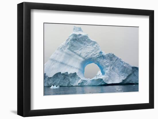 Antarctica. Charlotte Bay. Giant Iceberg with a Hole-Inger Hogstrom-Framed Photographic Print