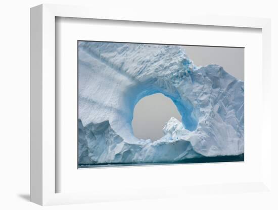 Antarctica. Charlotte Bay. Giant Iceberg with a Hole-Inger Hogstrom-Framed Photographic Print