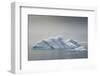 Antarctica. Charlotte Bay. Iceberg and Falling Snow-Inger Hogstrom-Framed Photographic Print