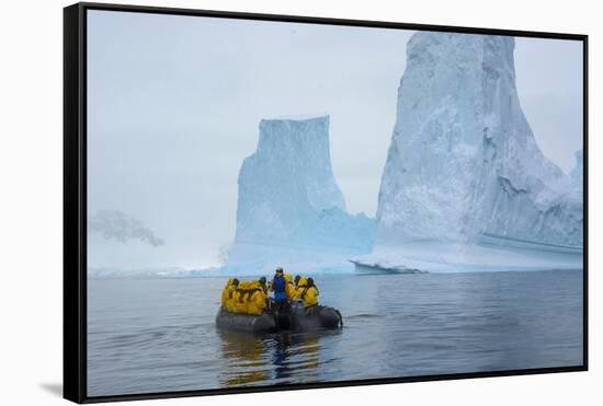 Antarctica. Charlotte Bay. Zodiac Cruising around Icebergs-Inger Hogstrom-Framed Stretched Canvas