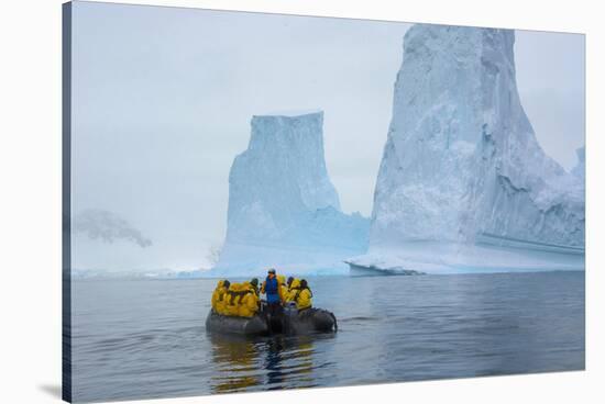 Antarctica. Charlotte Bay. Zodiac Cruising around Icebergs-Inger Hogstrom-Stretched Canvas