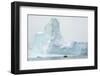 Antarctica. Charlotte Bay. Zodiac Dwarfed by a Giant Towering Iceberg-Inger Hogstrom-Framed Photographic Print