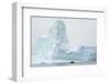 Antarctica. Charlotte Bay. Zodiac Dwarfed by a Giant Towering Iceberg-Inger Hogstrom-Framed Photographic Print