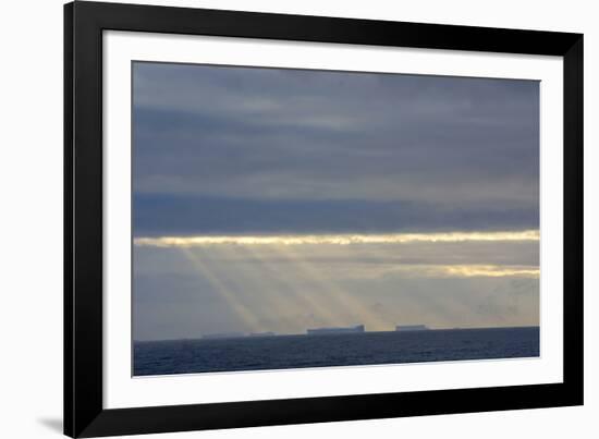 Antarctica. Crepuscular Rays Shining Down onto Tabular Icebergs-Inger Hogstrom-Framed Photographic Print