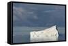 Antarctica. Gerlache Strait. Iceberg and Cloudy Skies-Inger Hogstrom-Framed Stretched Canvas