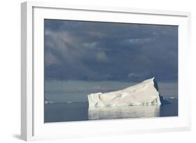Antarctica. Gerlache Strait. Iceberg and Cloudy Skies-Inger Hogstrom-Framed Photographic Print