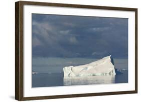 Antarctica. Gerlache Strait. Iceberg and Cloudy Skies-Inger Hogstrom-Framed Photographic Print