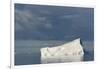 Antarctica. Gerlache Strait. Iceberg and Cloudy Skies-Inger Hogstrom-Framed Photographic Print