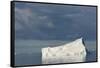 Antarctica. Gerlache Strait. Iceberg and Cloudy Skies-Inger Hogstrom-Framed Stretched Canvas