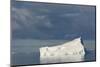 Antarctica. Gerlache Strait. Iceberg and Cloudy Skies-Inger Hogstrom-Mounted Photographic Print