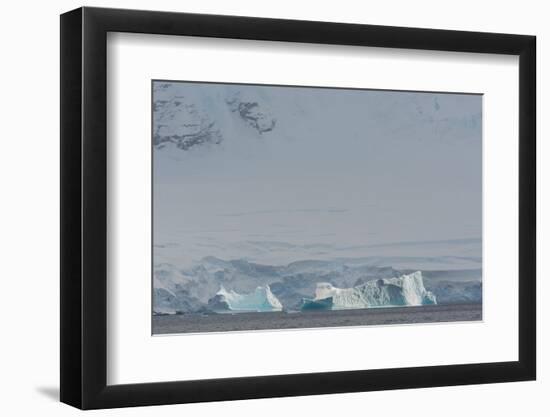 Antarctica. Gerlache Strait. Iceberg with Glacier in the Background-Inger Hogstrom-Framed Photographic Print