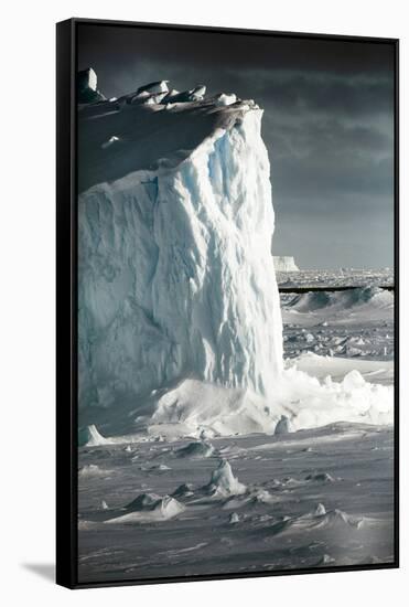 Antarctica. Iceberg at Sunrise Surrounded by Sea Ice-Janet Muir-Framed Stretched Canvas