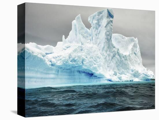 Antarctica, large iceberg, blue ice-George Theodore-Stretched Canvas