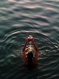 Woman Pouring Water During Morning Puja on Ganges, Varanasi, India-Anthony Plummer-Photographic Print