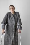 Woman Standing on Crutches-Anthony West-Photographic Print