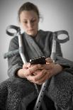 Woman Seated with Crutches-Anthony West-Mounted Photographic Print