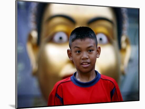 Anti-Government Protester Listens to Speeches in a Main Commercial Shopping District in Bangkok-null-Mounted Photographic Print