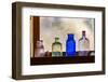 Antique colored bottles in window, Prescott National Forest, Jerome, Arizona-Adam Jones-Framed Photographic Print