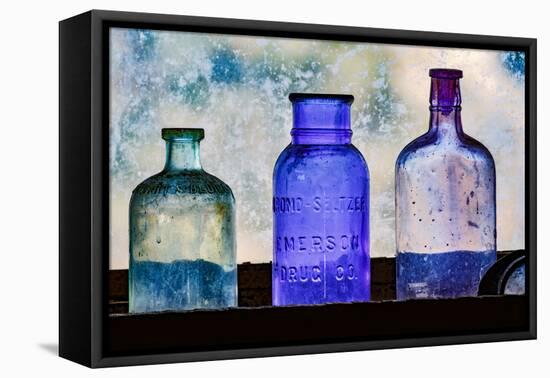 Antique colored bottles in window, Prescott National Forest, Jerome, Arizona-Adam Jones-Framed Stretched Canvas