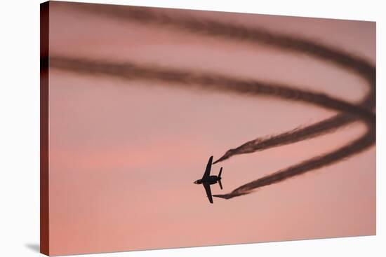 Antique fighter jet does a fly-by at the Madras Airshow, Oregon.-William Sutton-Stretched Canvas