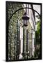 Antique Lamp On A Fence-George Oze-Framed Photographic Print