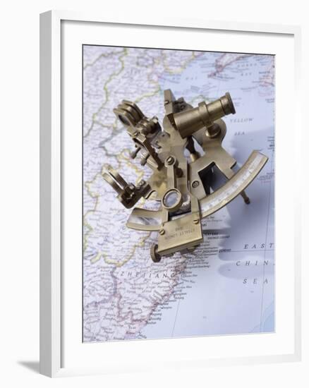 Antique Sextant on a Map-null-Framed Photographic Print