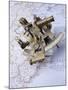 Antique Sextant on a Map-null-Mounted Photographic Print