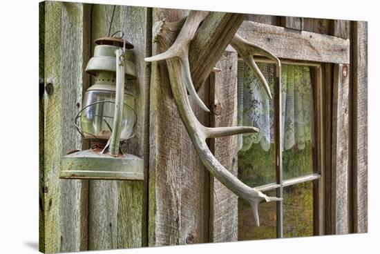 Antlers and Lantern Hanging on Rustic Home, Stehekin, Washington, USA-Jaynes Gallery-Stretched Canvas