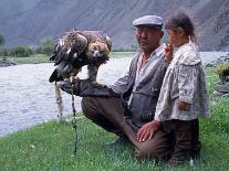 Mongolia, Kasakh Hunter with Eagle by the Khovd River, with a Small Child-Antonia Tozer-Photographic Print