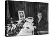 Antonio De Olivera Salazar Sitting at His Desk-Bernard Hoffman-Stretched Canvas