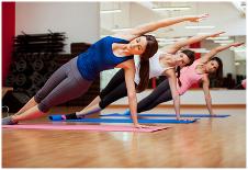 Side Plank Yoga Pose By Three Women-Antonio Diaz-Framed Poster