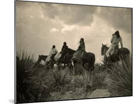 Apaches. before the Storm- Four Apache on Horseback on Horseback under Storm Clouds, 1906-null-Mounted Art Print