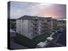 Apartment Building at Sunset-null-Stretched Canvas