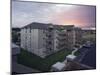 Apartment Building at Sunset-null-Mounted Photographic Print