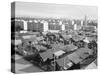 Apartment Buildings and Wooden Shacks-null-Stretched Canvas
