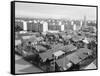 Apartment Buildings and Wooden Shacks-null-Framed Stretched Canvas